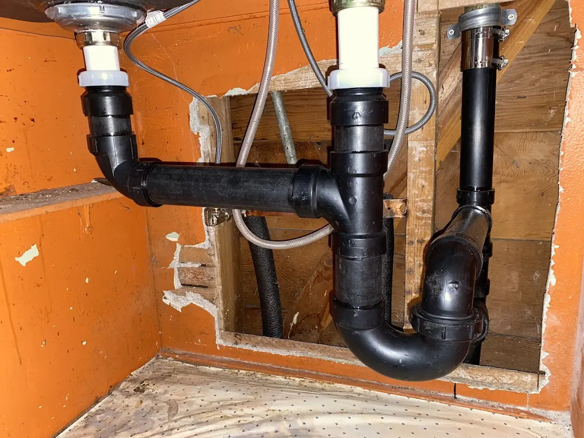 Professional Garbage Disposal Repair equipment and tools on the job in Springfield